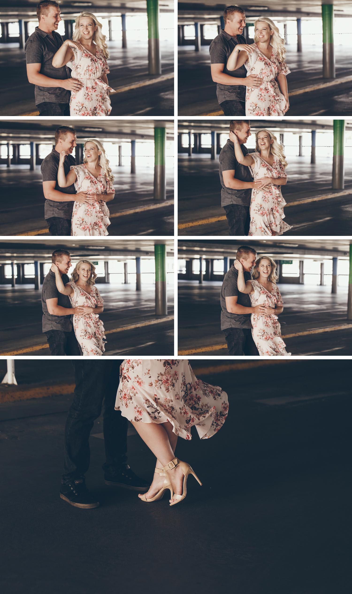 Couple Embracing Car Park Engagement Shoot, Wide Angle Shot of Bride and Groom Embracing by Danae Studios
